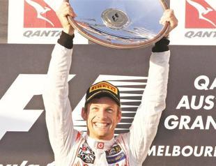 McLaren’s Button wins thrilling opener