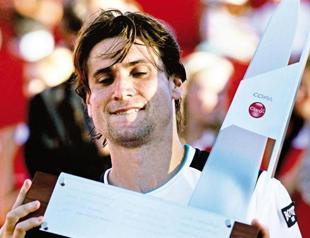 Ferrer beats Almagro for his 13th title