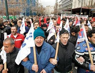 Large Greek trade unions walk off as EU pressure increases