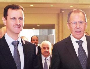 Russia seeks talk, Assad vows to fight