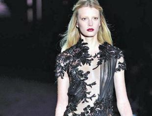 Gucci’s dark glamour on runway in Milan