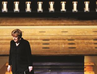 Forgive us, Merkel tells racism victims