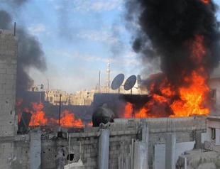 Syria to try to evacuate journalists from Homs