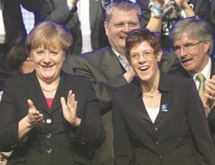 State poll offers boost for Merkel but crushes allies