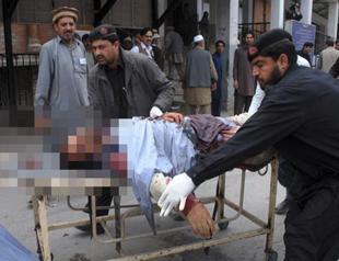Suicide bombing kills 13, wounds 30 in Pakistan