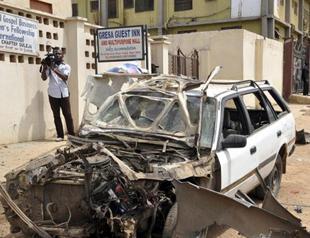 Nigeria church bombing, reprisal attacks kill 13