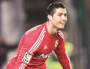 Ronaldo scores twice as Real sets new club record