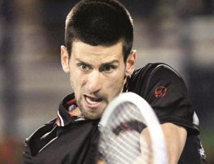 Djokovic cruises to 3rd round, Murray beaten