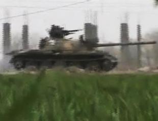 Syrian troops enter Lebanon, clash with rebels