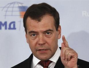 Russias Medvedev tells Romney to use head