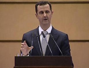 New Syria charter ends near 50-year Baath rule