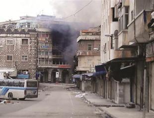 Syrian troops advance in Homs as aid calls mount