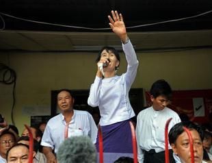 Suu Kyi says Myanmar on cusp of new era
