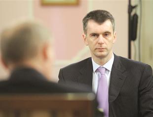 Putin opens cabinet door to rival tycoon Prokhorov