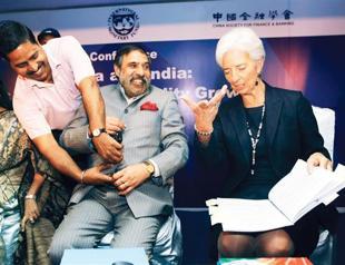 IMF’s Lagarde says world back from financial abyss, weaknesses remain