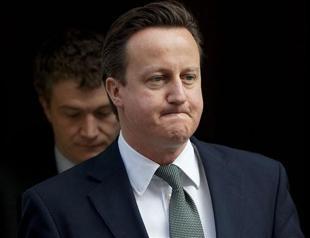 Britain budget to drive down deficit, cut income tax