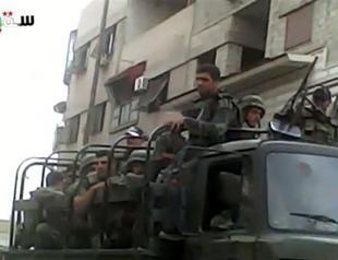 Syria wants guarantees to pull troops from cities