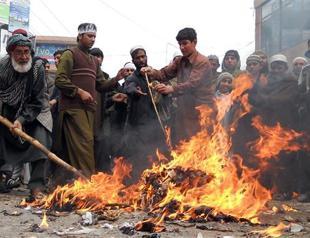 Koran burning anger hits US-Afghan strategy talks