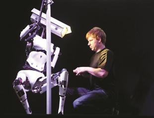 Robots turn heads at high-tech fair