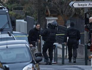 Police inside French shooting suspects apartment: source