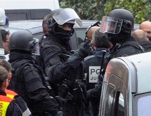 France suspect died after jumping out window: minister