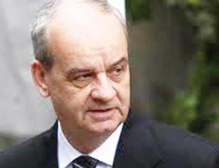 Court suspends charges against intelligence official