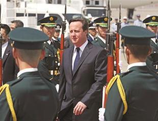Cameron seeks chances in arms-hungry Japan