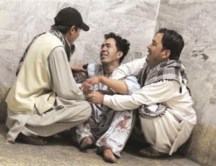 Suicide bombers kill over 20 in Afghanistan