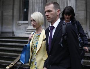 Inquest sees video of holdall with British spys body