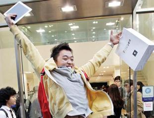 Apple profits hit $11.6 bln on iPhone-iPad sales