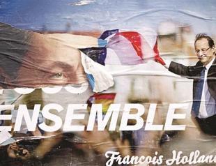 Hollande looks for votes of immigrants