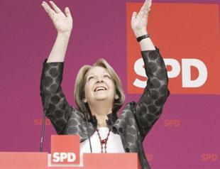 Merkel dealt bitter election defeat