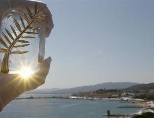 Cannes curtain goes up with whimsy, glamour