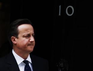 UKs Cameron urges action to resolve euro crisis