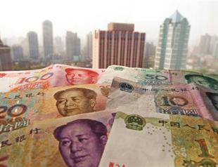 Monetary fund, US, welcome China move on wider yuan trading band
