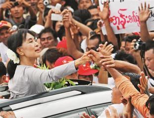 Myanmar’s Suu Kyi to travel overseas next week