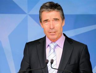 NATO chief pledges to meet Afghan handover goal
