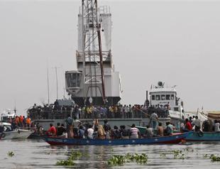 India ferry capsizes; 103 dead, 100 missing