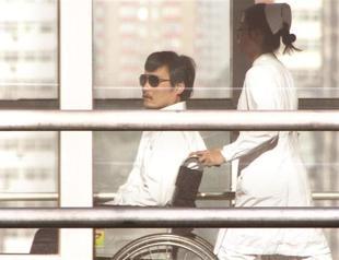 Chen wants to kiss Clinton as Beijing seeks apology