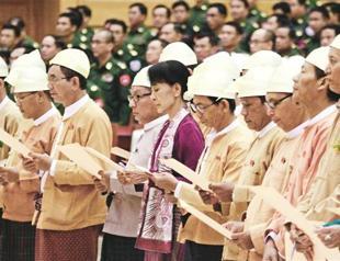 Suu Kyi takes historic oath in Parliament