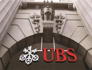 UBS first quarter profits drop 54 pct