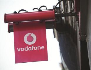 Vodafone cuts sales target on weak European market