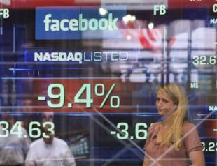 Facebook shares hit again