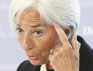 IMF chief warns of crisis taint
