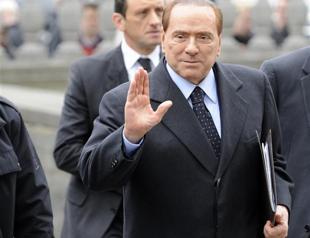 Berlusconi shows up for prostitution trial