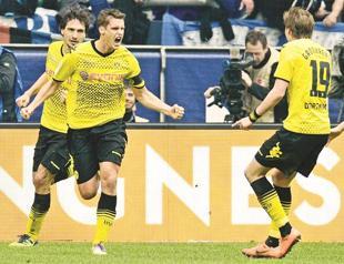 Dortmund on brink of Bundesliga glory