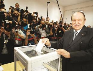 Algeria votes in first poll since uprisings