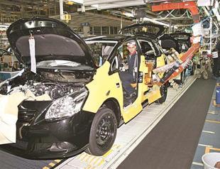 Toyota says performance, not religion, behind layoffs