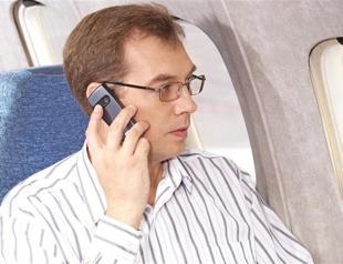 Travelers are against phone use on planes