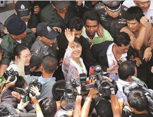 Suu Kyi on historic trip abroad